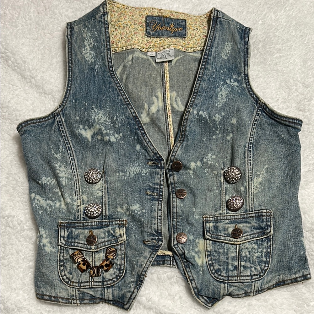 Younique Denim Vest with embellishments and angel wings on back.